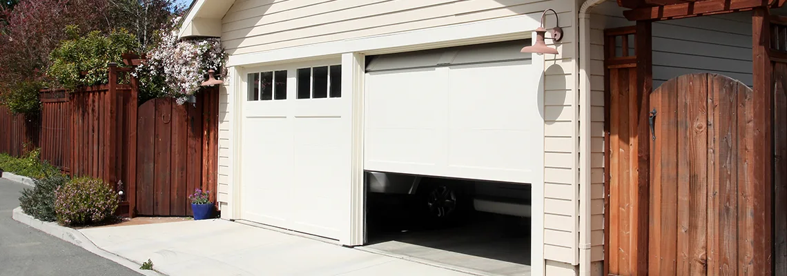 Fix Metal Garage Door Jerking in Granite City, Illinois